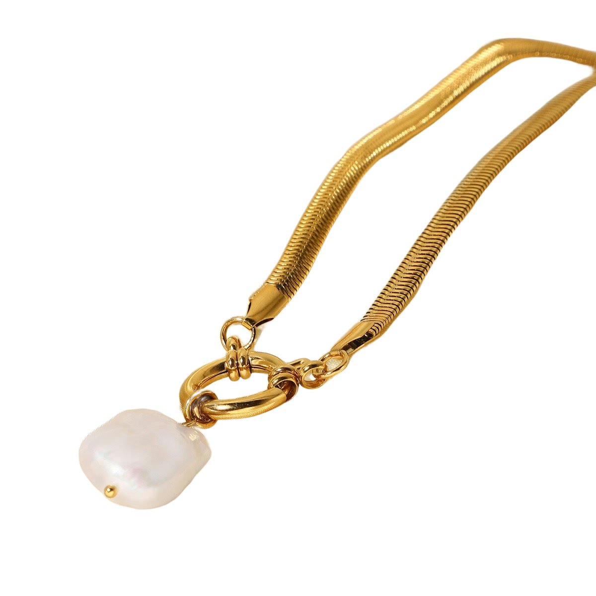 A flat gold chain with one uneven pearl